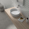 Ruvati 23 x 14 inch Fluted Vessel Bathroom Sink epiStone Solid Surface Modern Oval Matte White - RVB2823WH
