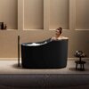 Ruvati 55-inch Freestanding Bath Tub Japanese Ofuro Soaking Tub Solid Surface epiStone in Matte Black - RVB6740BK