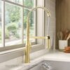 Ruvati Seneca Brushed Gold Single Handle Pull Down Kitchen Faucet Tall High Arc Commercial with Pre-Rinse Sprayer - RVF1233SG