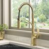 Ruvati Seneca Single Handle Pull Down Spring Kitchen Faucet with Pre-Rinse Sprayer in Brushed Gold - RVF1236SG