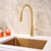 Ruvati Vestia Single Handle Pull Down Kitchen Faucet Knurled Modern Arc with Sprayer in Brushed Gold - RVF1237SG